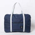 Gage women's waterproof ABS shoulder bag in blue with envelope closure