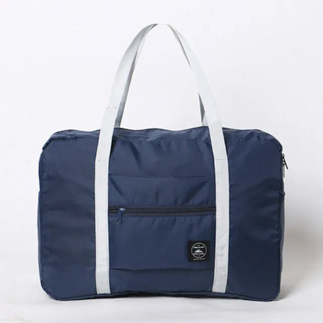 Gage women's waterproof ABS shoulder bag in blue with envelope closure