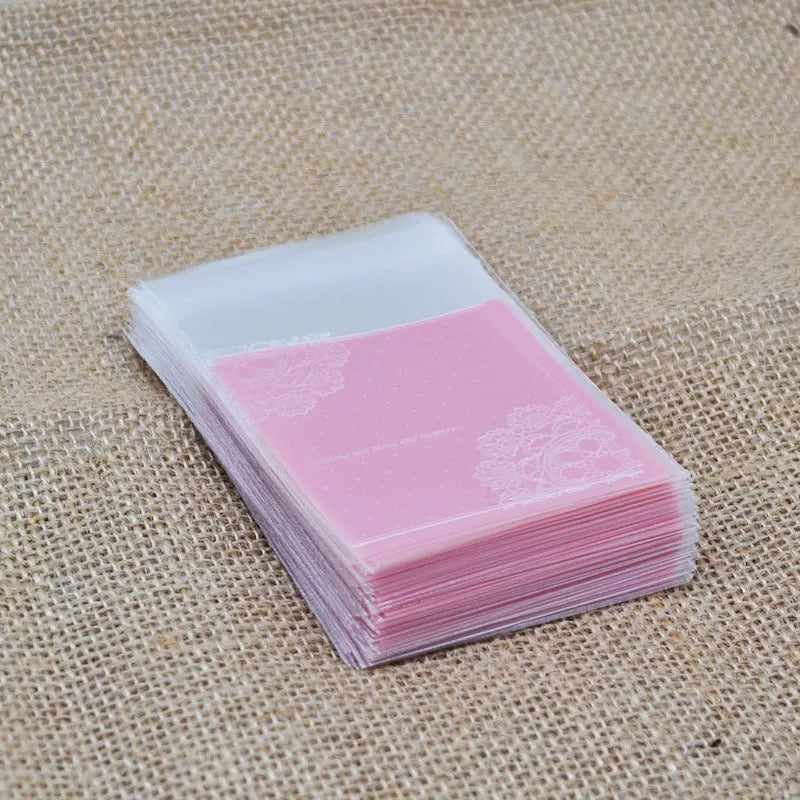 Pink self-adhesive plastic packaging bags for handmade soap with UV printing measuring 7x7cm