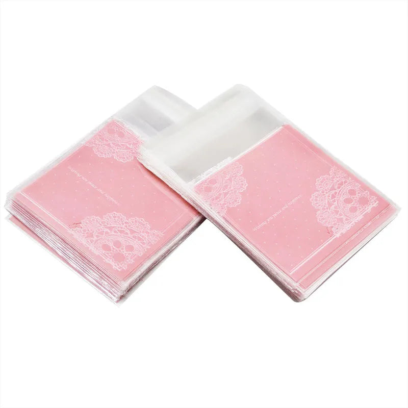 Pink self-adhesive plastic packaging bags for handmade soap with UV printing measuring 7x7cm