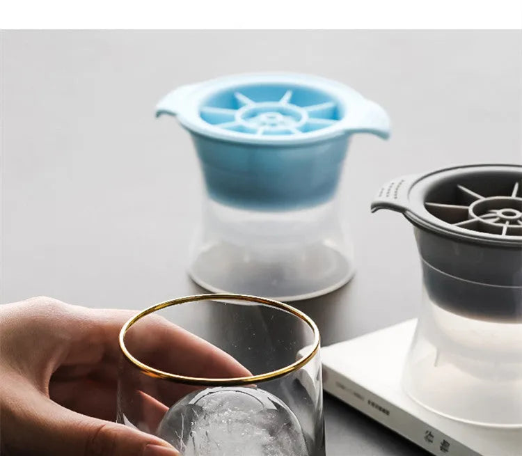 Silicone ice tray producing large ice hockey artefacts and geometric ice cubes in multiple colour variations