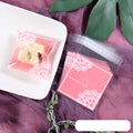 Pink self-adhesive plastic packaging bags for handmade soap with UV printing measuring 7x7cm