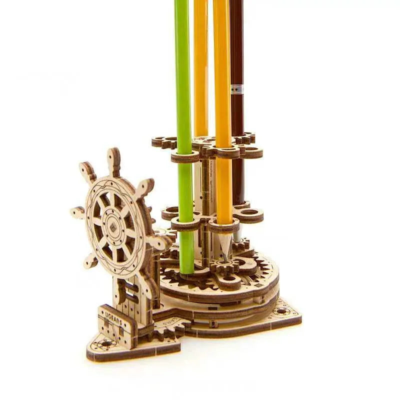 Wooden rotating pen holder with Ukrainian steering wheel design on wooden base