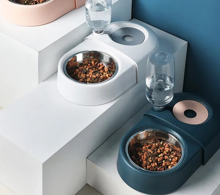 Anti-overturning plastic pet food bowl in blue with non-slip base on tile floor