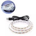 Close-up of a flexible white USB LED light strip showing SMD5050 LEDs and a connected USB cable.