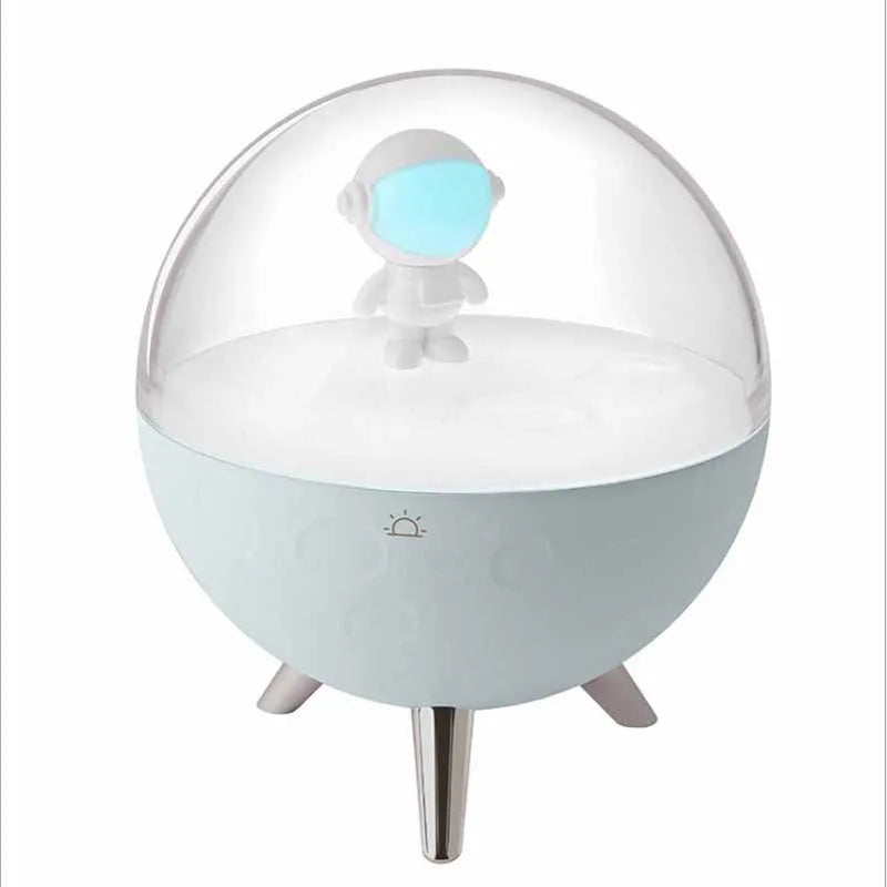 Modern cartoon-style USB LED desk lamp on a bedside table, showing white light option.