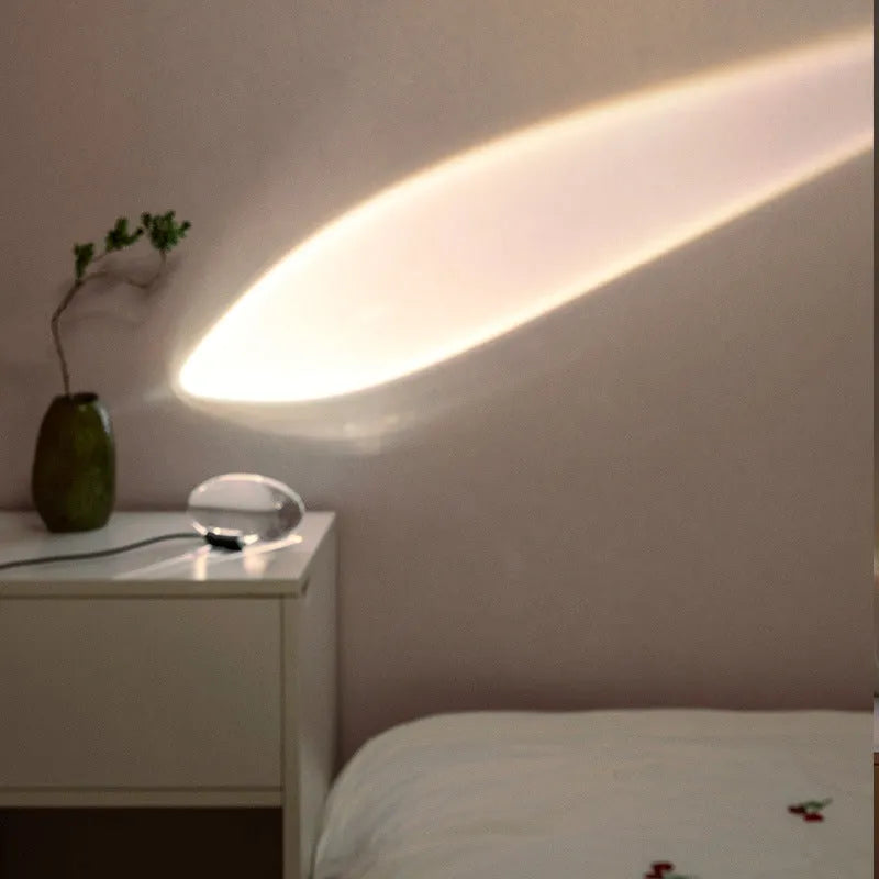Crystal projection lamp with LED warm light and push button switch on a table