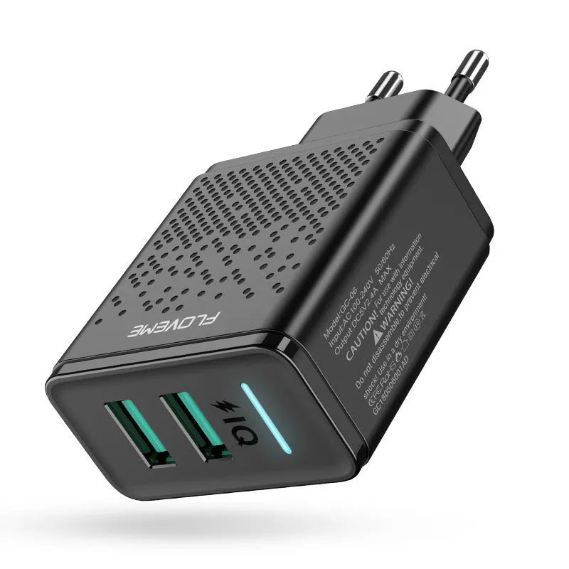 A black or white dual USB port wall charger with an EU standard power plug.