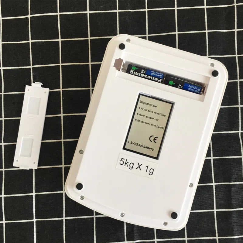 SF-400A black electronic digital kitchen scale on a countertop showing a weight display.