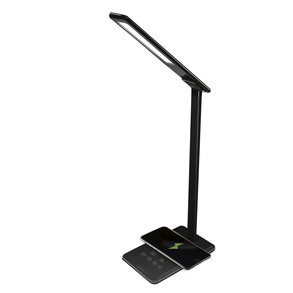 Black and white wireless charging desk lamp with touch controls and aluminium shade.
