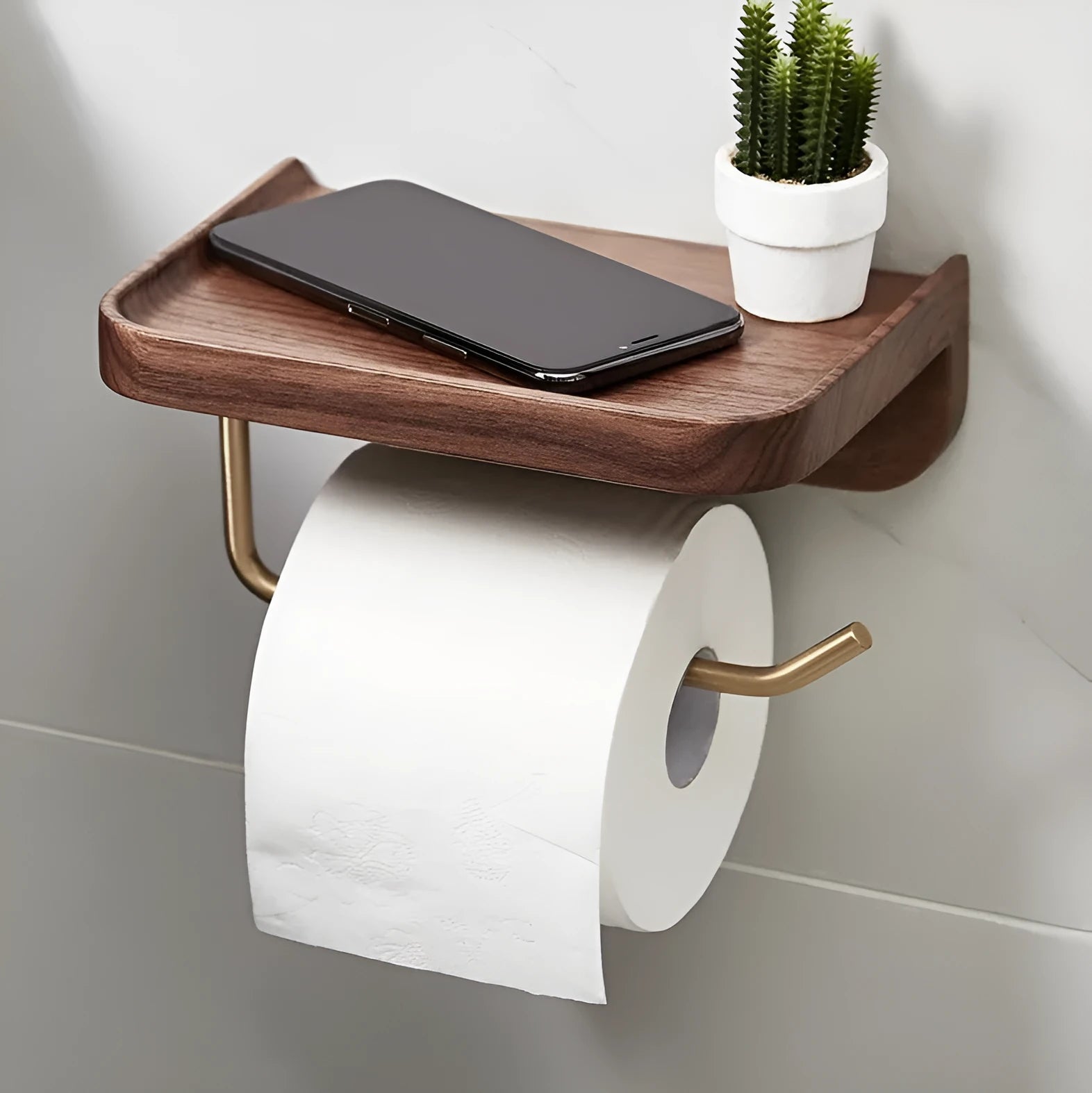 Solid walnut wood and brass wall-mounted paper towel holder and toilet roll rack.