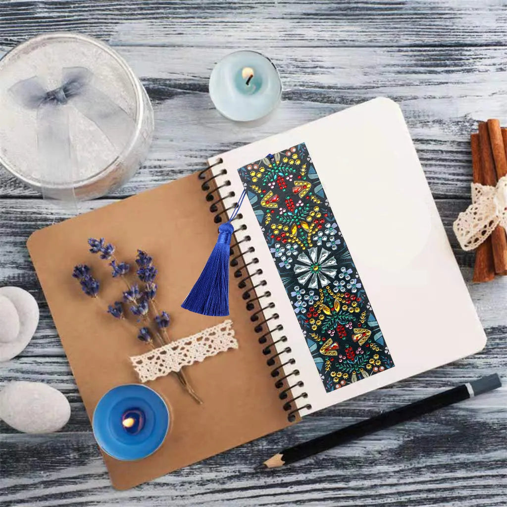 Leather bookmark with hand-embroidered diamond mandala flower design using special-shaped and round diamonds.
