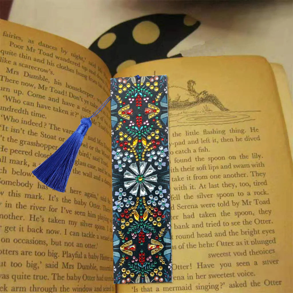 Leather bookmark with hand-embroidered diamond mandala flower design using special-shaped and round diamonds.