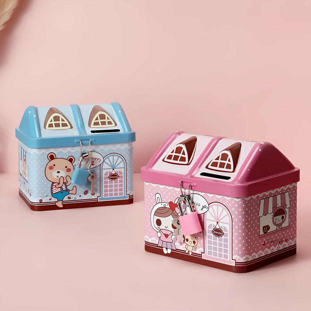 Blue tinplate house-shaped piggy bank with coin slot lid on wooden desk