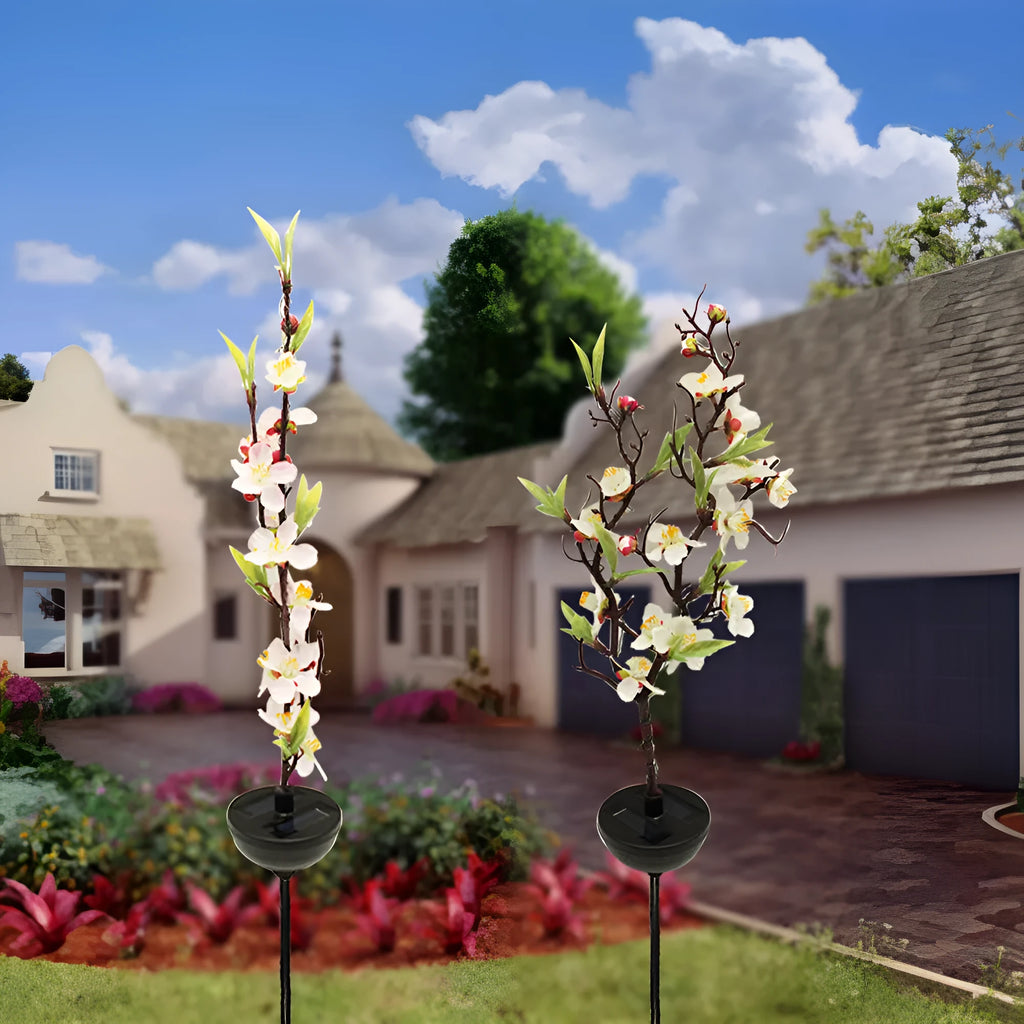 Solar-powered cherry firework string decorative light with ground stake for outdoor garden placement