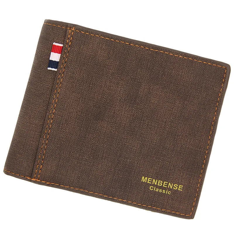 Men's genuine cowhide leather tri-fold wallet in open position showing interior card slots and currency compartments