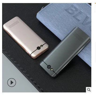 M9 electronic language translator device in gold or silver grey colour with USB power port.