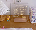 Bedside lamp with 5W LED light in simulation candle or message board design options