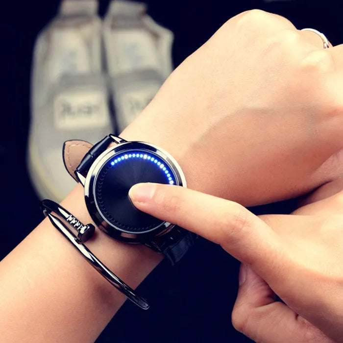 Electronic digital wristwatch with blue LED backlight and number display in black or white