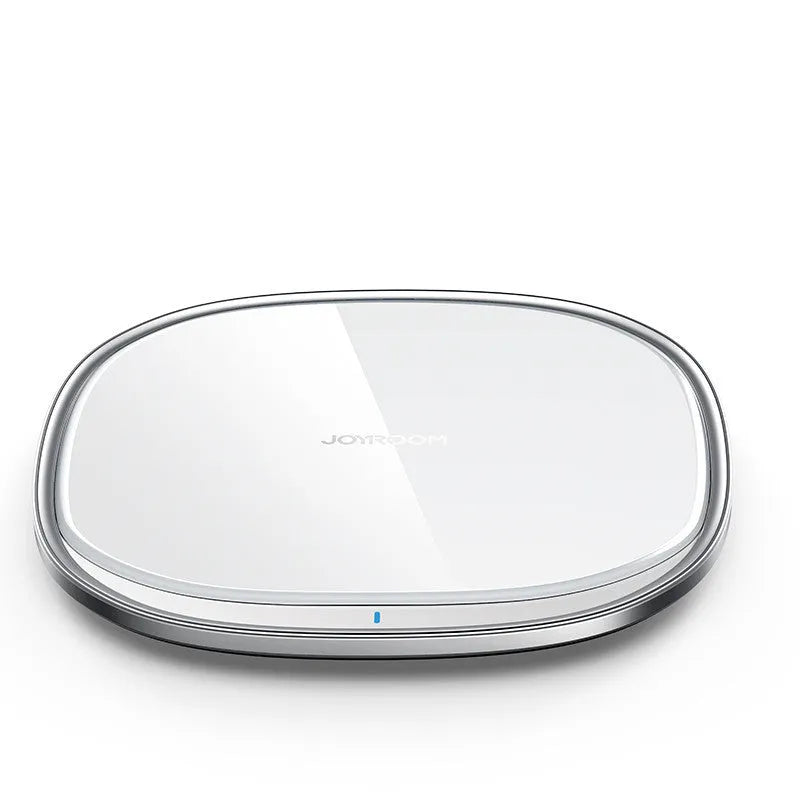 Black 15W wireless phone charger with glass top and zinc alloy body on a desk