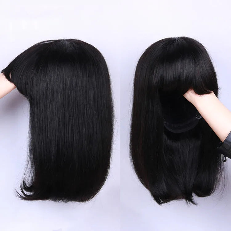 Black human hair wig with 10 inch length and machine-wefted construction