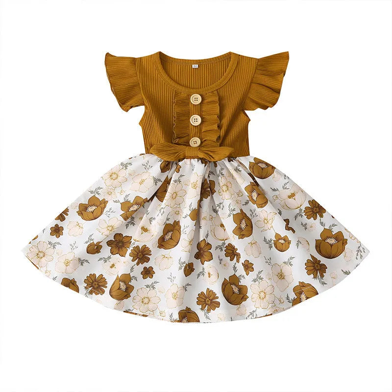 Toddler girl in a sleeveless summer dress, shown in one of six available colours including green, black, or pink.