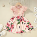 Toddler girl in a sleeveless summer dress, shown in one of six available colours including green, black, or pink.