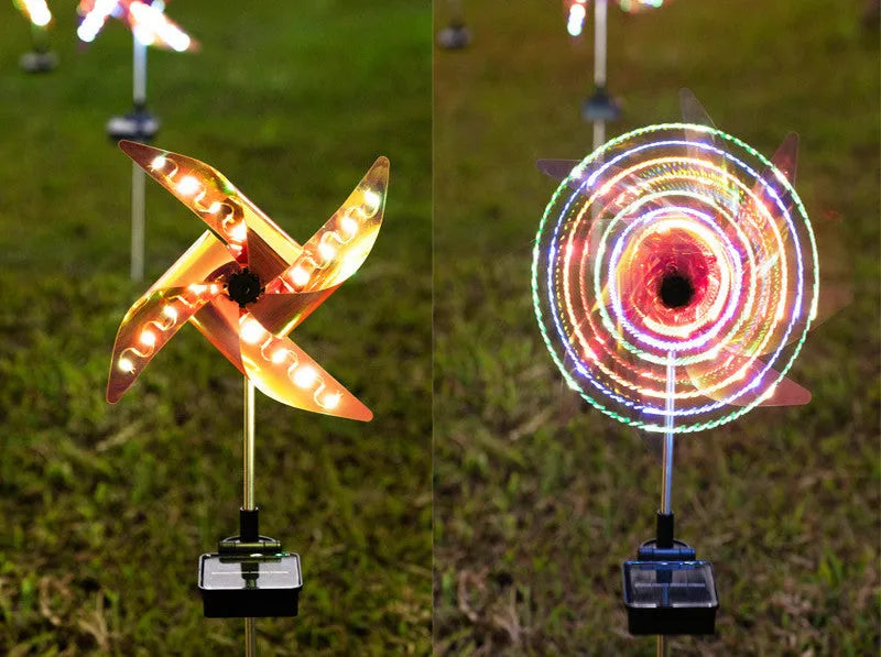 Solar wind spinner light with LED illumination spinning on lawn at dusk, showing IP65 waterproof aluminium and ABS construction