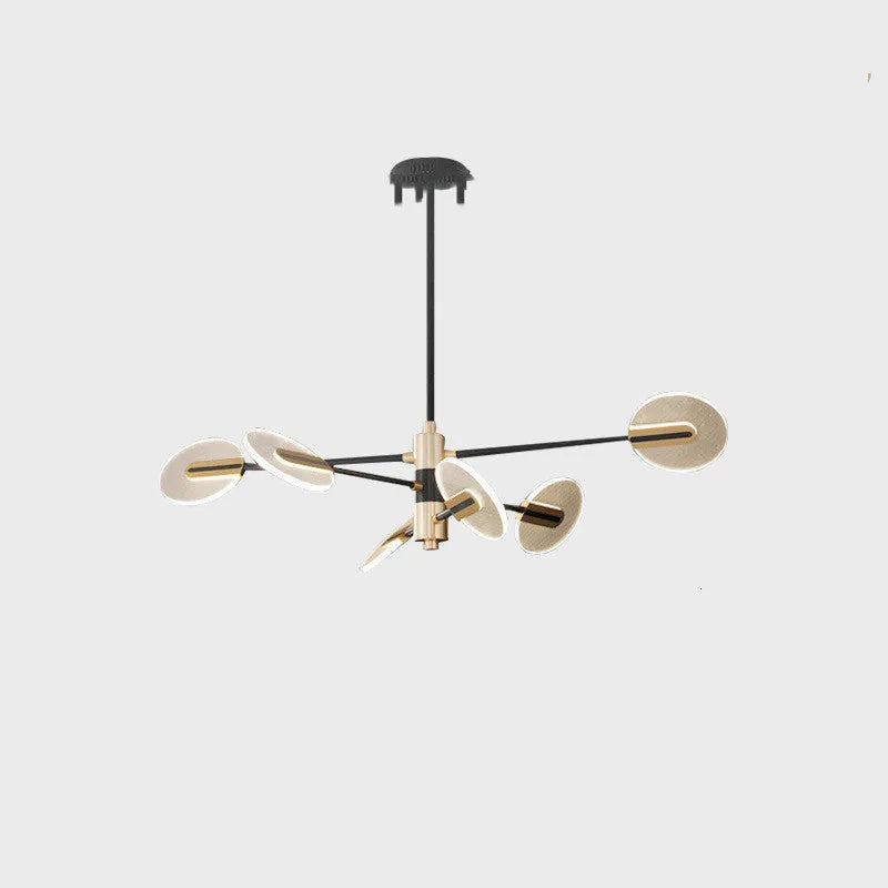 Nordic iron LED chandelier with acrylic elements hanging in a dining room setting