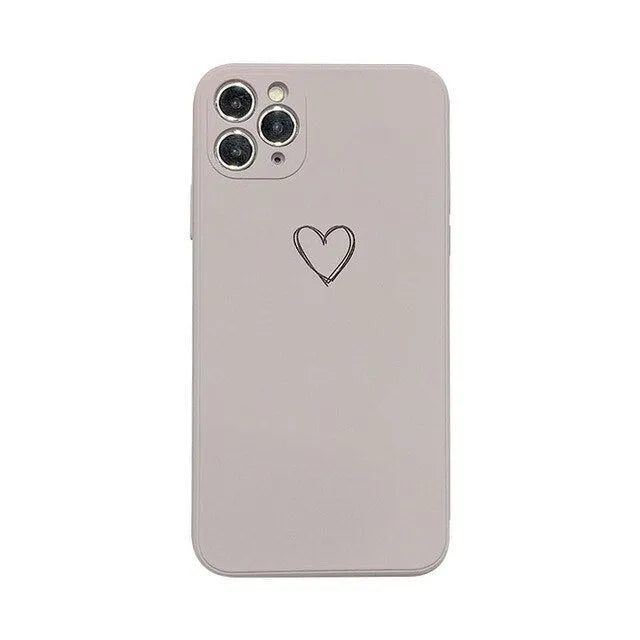 Solid colour silicone TPU phone case for Apple iPhone on a table.
