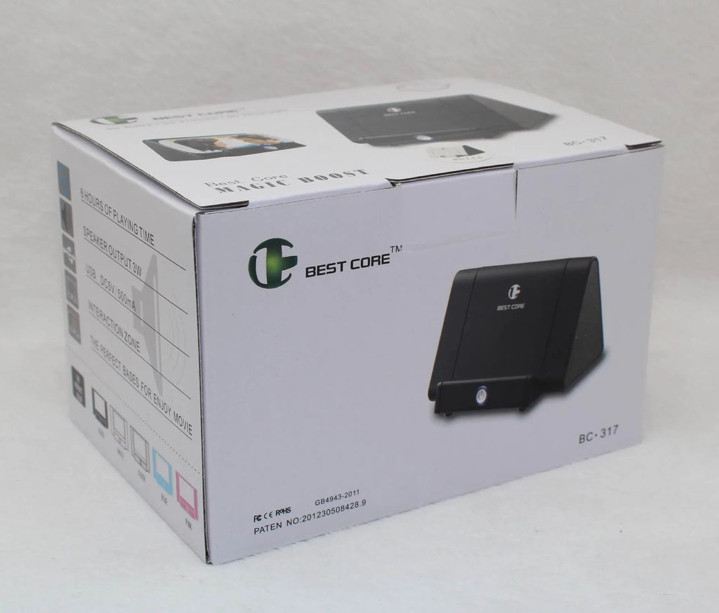 Mobile phone stand speaker in black with phone resting on stand showing speaker grille