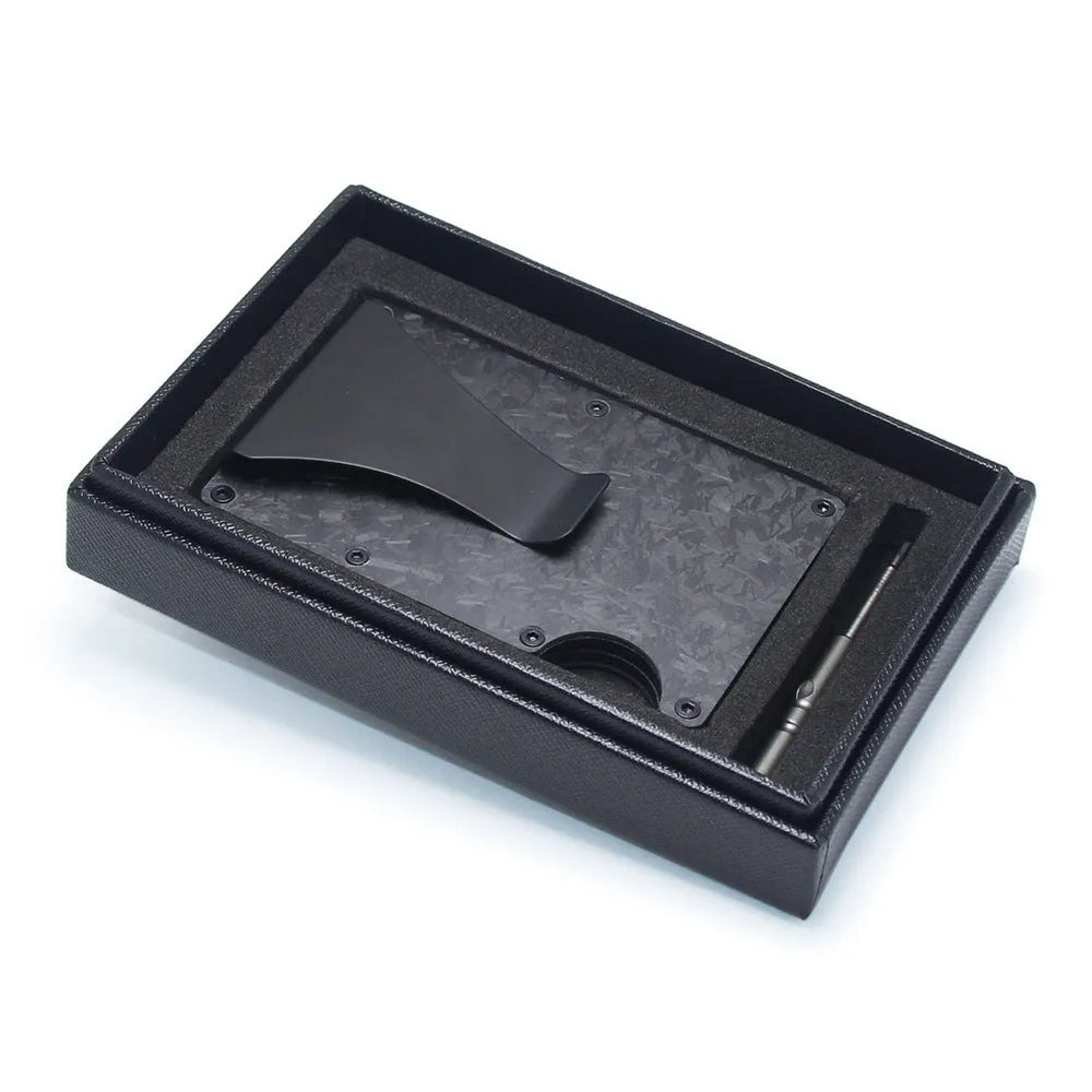 Black geometry-style slim card holder for bank cards and notes on a table
