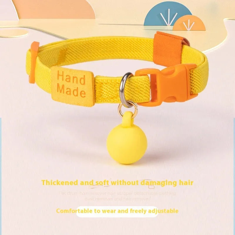 A small dog collar made from high elasticity polyester fabric in a choice of seven colours, adjustable between 22 and 32 cm.