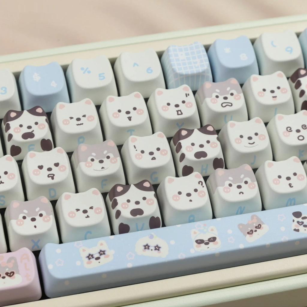 PBT sublimation key cap set showing colourful puppy and cat artwork on mechanical keyboard keys