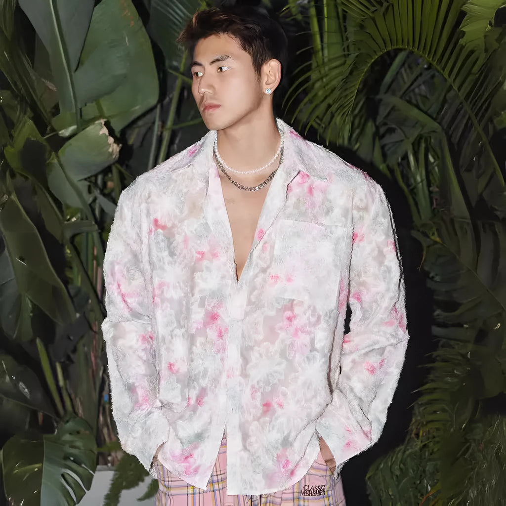 Men's blue embossed floral long sleeve shirt with loose fit on a hanger