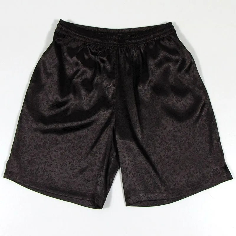 Men's black Tang suit shorts with an elastic drawstring waistband, laid flat.