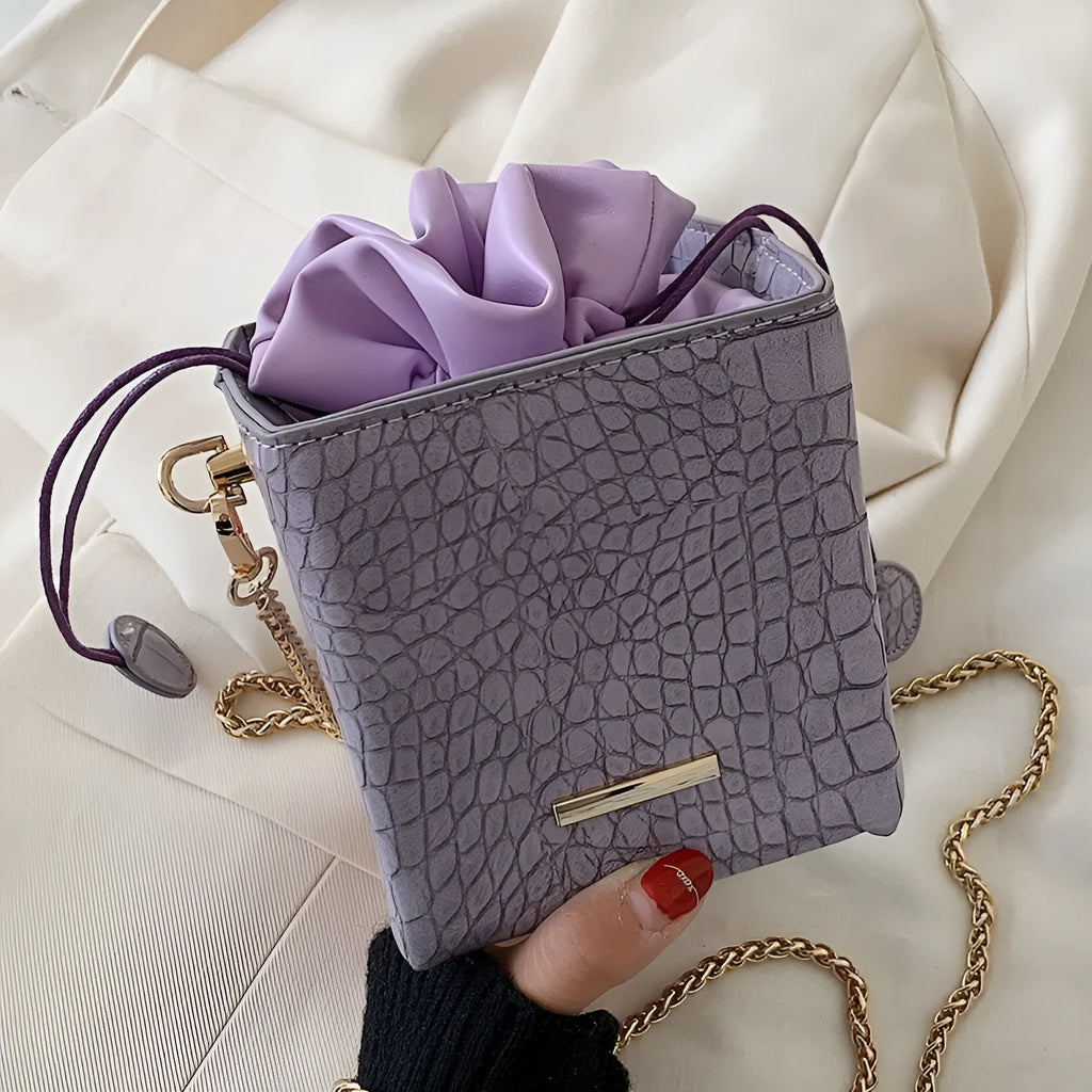 One shoulder messenger bag with fashion chain detail in bucket shape available in six colours