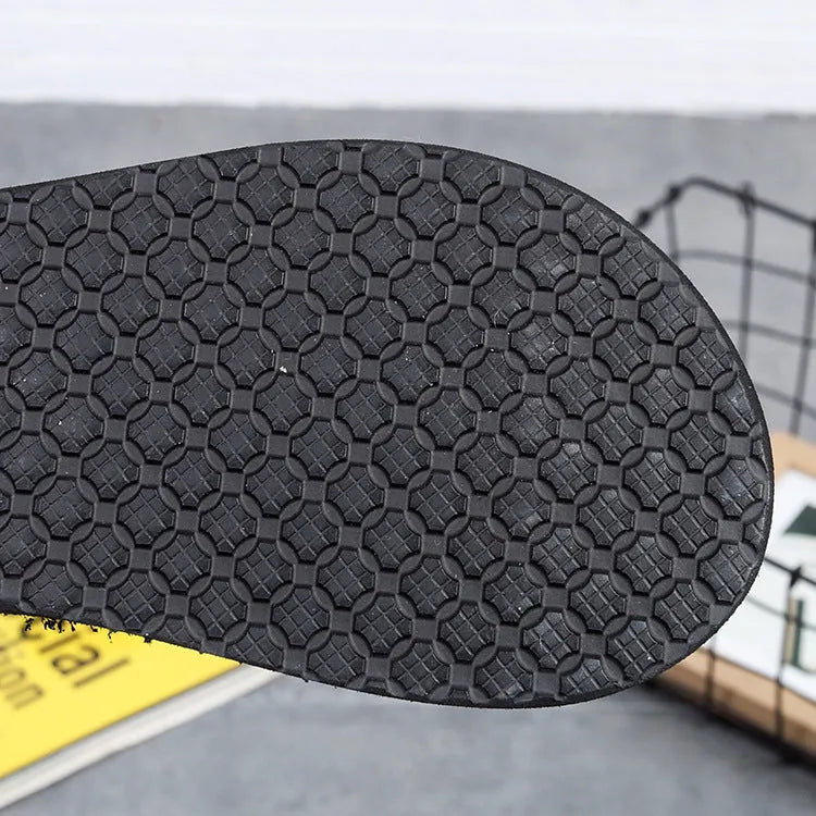 Women's brown bohemian slippers with elastic EVA upper, rubber sole, and an adjustable webbing clip.