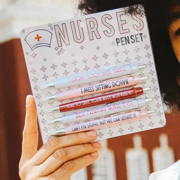 Five nurse-themed ballpoint pens with humorous medical copywriting in plastic retractable design