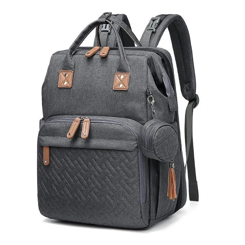 Oxford baby diaper backpack in black with vertical square shape, soft handles, and visible sewing lines
