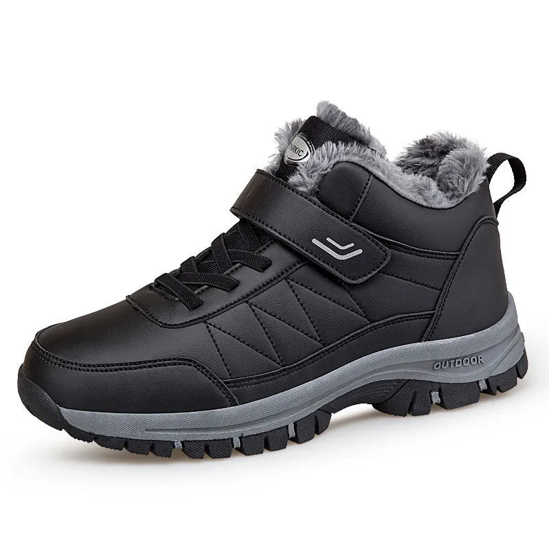 Men's high-top hiking shoes in black, with lace-up closure and rubber sole on outdoor ground