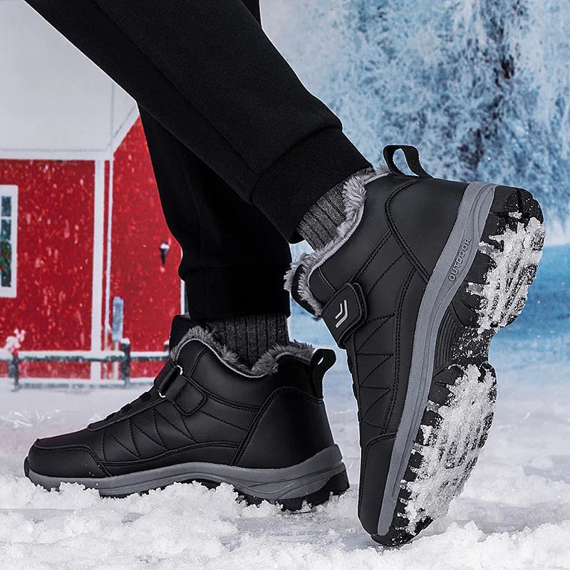 Men's high-top hiking shoes in black, with lace-up closure and rubber sole on outdoor ground