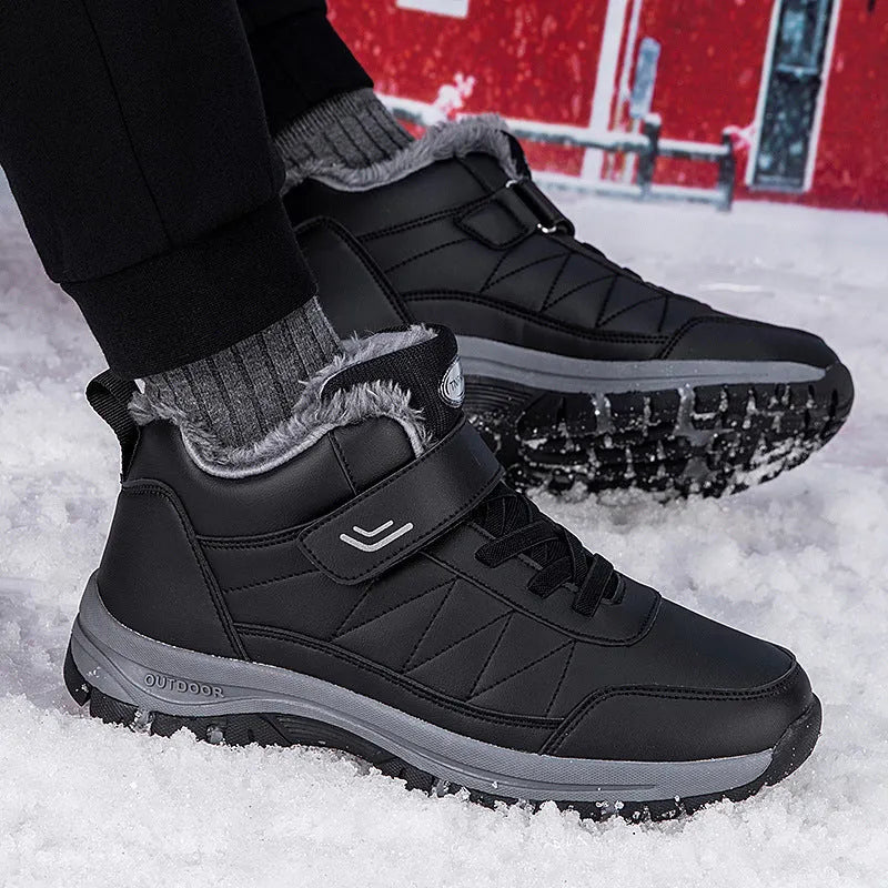 Men's high-top hiking shoes in black, with lace-up closure and rubber sole on outdoor ground