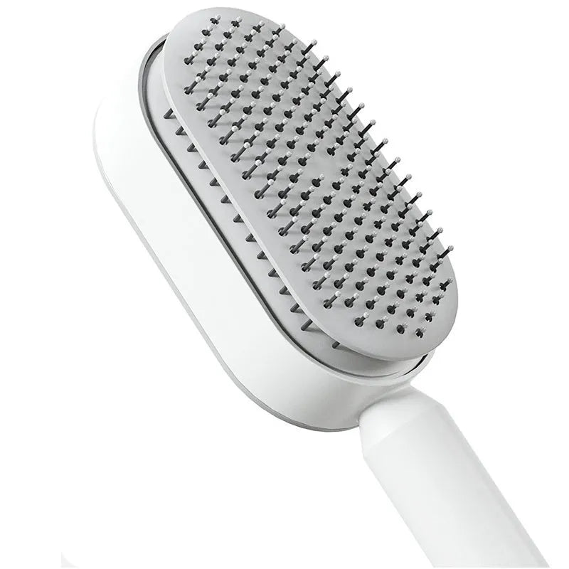 Automatic cleaning hair comb with 3D air cushion in pink, measuring 25x7x5cm, with ergonomic handle for scalp massage