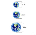 Glow in the dark Planet Earth wall sticker in three sizes: 10cm, 20cm, and 30cm diameter.