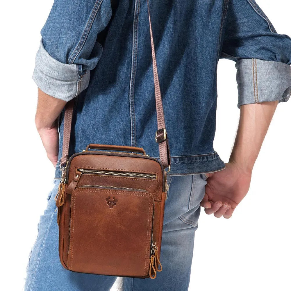 Men's brown genuine leather single-shoulder crossbody bag with sewing line detailing.