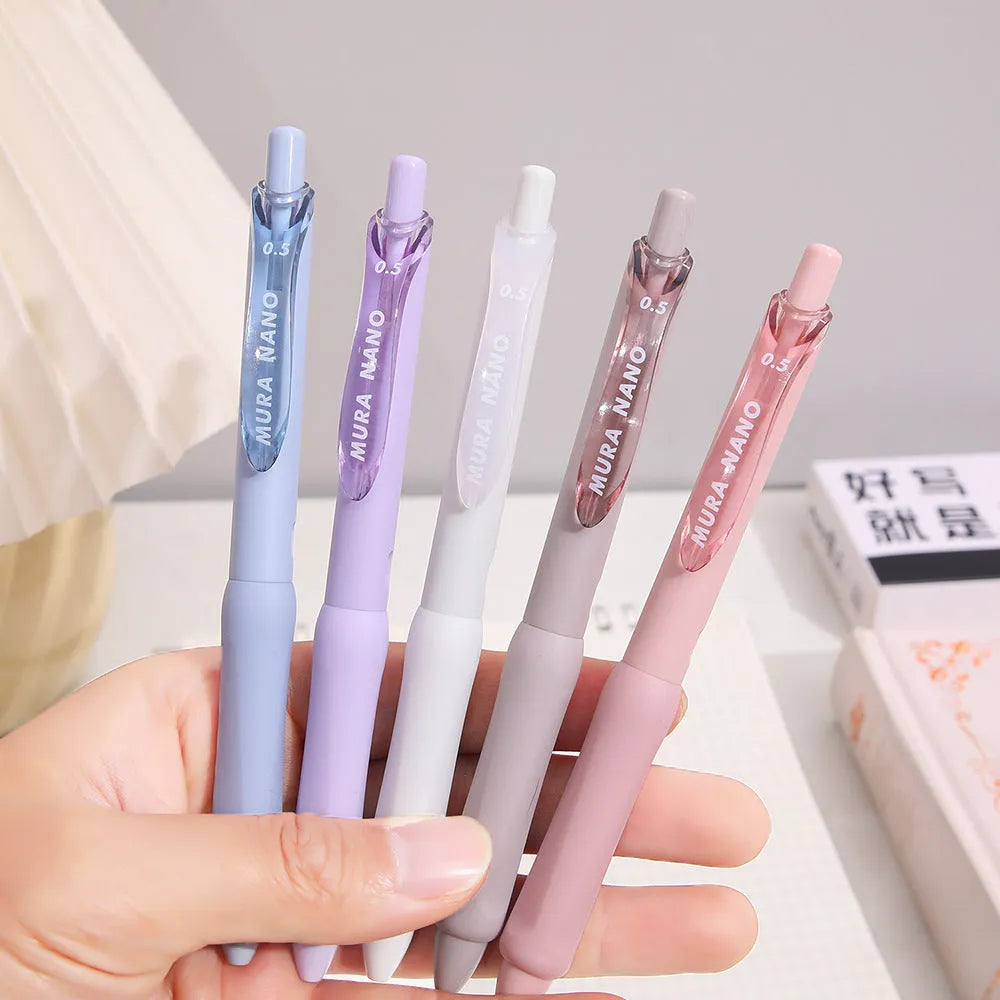 Macaron series press gel pen with 0.5mm tip in smoked brown, pink, or white ink options.