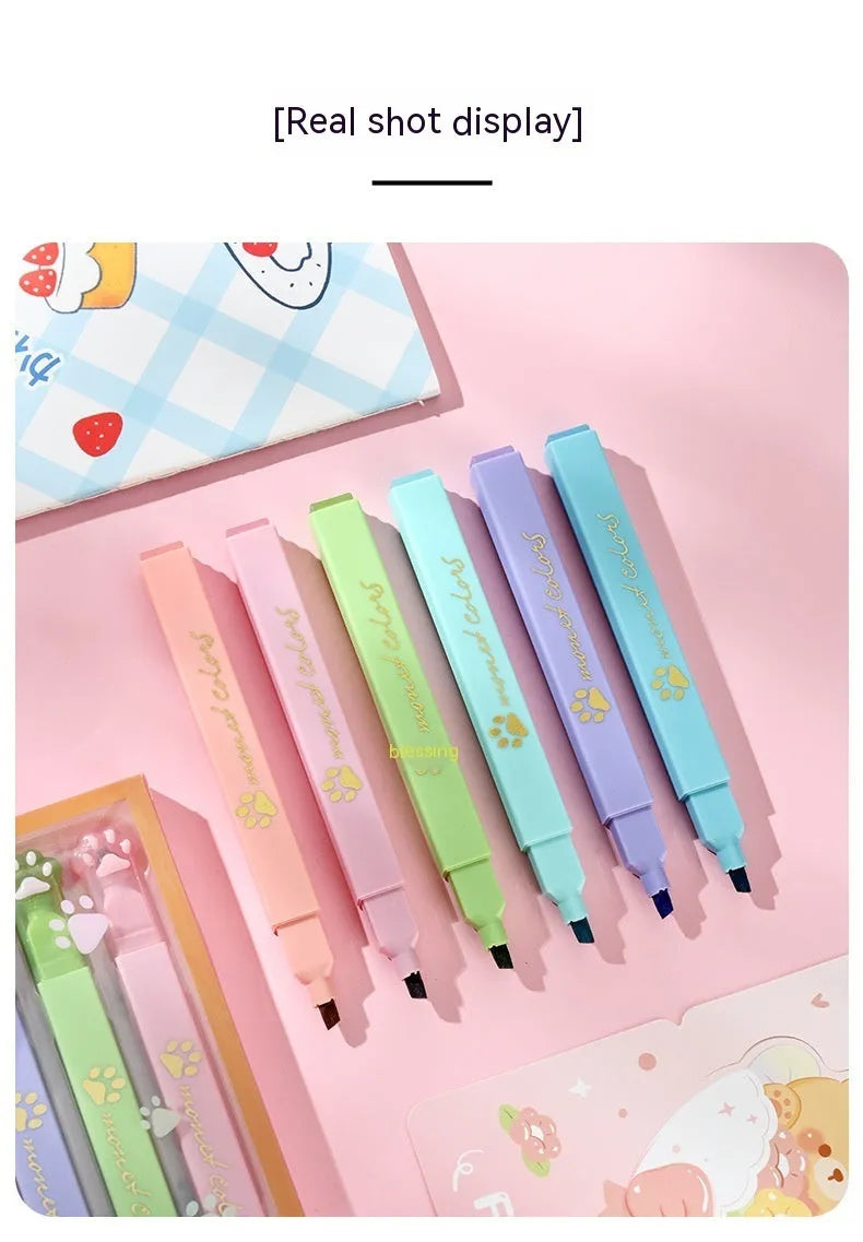 Cat's Paw fluorescent marking pen set showing six coloured pens with oblique heads in plastic packaging