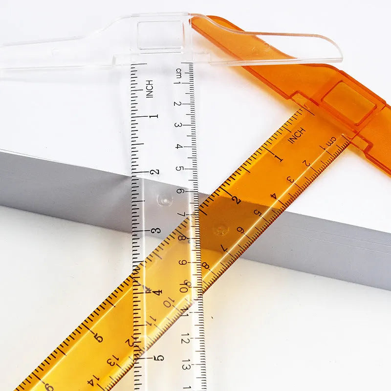Transparent and orange yellow plastic T-shaped rulers with British and double centimetre scale markings