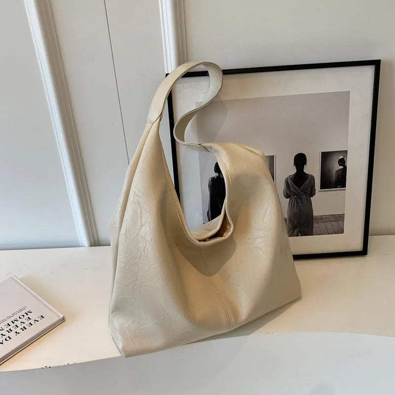 Soft leather casual shoulder bag with large capacity in street trend styling